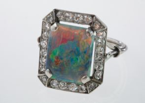 An Art Deco style opal and diamond plaque ring, good quality opal showing all colours,