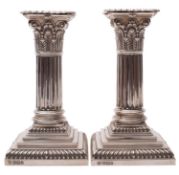 A pair of short Victorian Corinthian column candlesticks by Hawkesworth, Eyre & Co, Sheffield 1896,