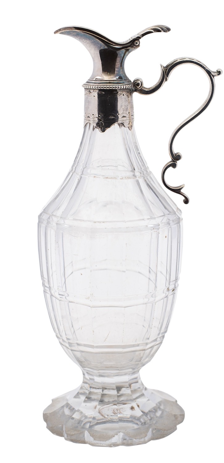 A George III silver mounted facetted glass cruet jug by William Stroud,