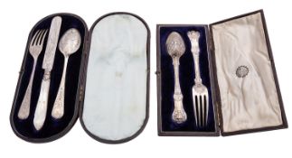 Two Victorian silver christening sets, the three piece by Josiah Williams & Co.