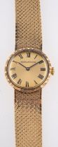 Jaeger Le-Coultre a lady's gold wristwatch with a bark finish to the bezel,