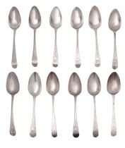 A matched set of twelve George III silver old English bright-cut tablespoons,