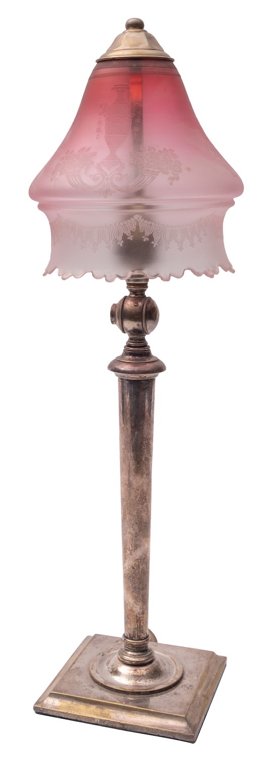 A late Victorian silver plated adjustable electric table lamp and glass shade, not marked,