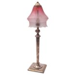 A late Victorian silver plated adjustable electric table lamp and glass shade, not marked,