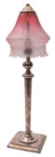 A late Victorian silver plated adjustable electric table lamp and glass shade, not marked,