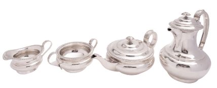 A matched silver four-piece tea service by William Hutton & Sons Ltd, Sheffield 1912, 1913 and 1932,