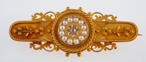 A Victorian gold brooch set with small diamond and seed pearls, in bloomed gold, unmarked, 4cm,