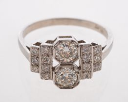 A contemporary Art Deco style diamond dress ring, in platinum mount, estimated diamond weight,