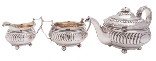 A late George III Scottish silver three piece tea service by William & Patrick Cunningham,