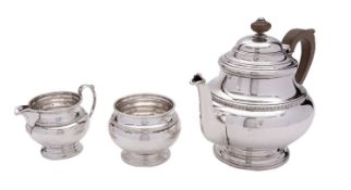 A silver three piece tea service by William Suckling Ltd, Birmingham 1930, baluster,