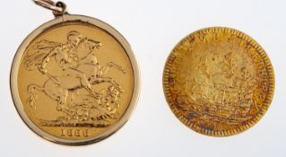 A Victoria gold sovereign,1886 in a pendant mount and a 'coin' with non milled edge,