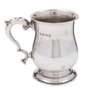 A silver mug by Barker Brothers Silver Ltd, Birmingham 1931,