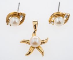 A Starfish gold pendant set with a single pearl and a pair of pearl earrings,