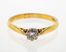 An 18ct gold solitaire diamond ring, brilliant cut stone of around 0.25 carat, ring size P .