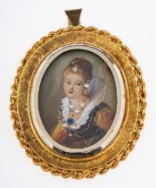 A gold portrait brooch, with painting of lady in 18th Century costume, studded with paste stones,