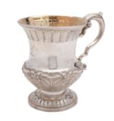 A William IV Irish silver christening mug by James Le Bas, Dublin 1834, of campana shape,