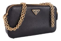 Prada, Italy, a small black leather handbag with gold coloured hardware, 20x11cm.