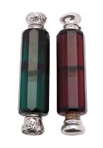 Two Victorian silver mounted facetted coloured glass double ended scent bottles, both unmarked,