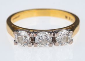 Three stone diamond ring, brilliant cut stones with a total carat weight of 1.