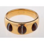 A late Victorian 18ct gold banded onyx ring