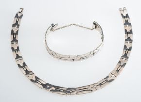 A mid 20th Century modernist design necklace and bracelet, hand crafted articulated links,