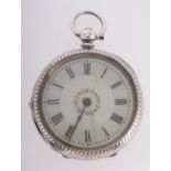 A silver pocket watch the dual with floral decoration, the case hallmarked for Birmingham, 1908,