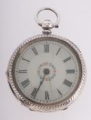 A silver pocket watch the dual with floral decoration, the case hallmarked for Birmingham, 1908,