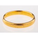 A 22ct gold wedding band, stamped 22 with full London hallmarks, ring size M, 3.