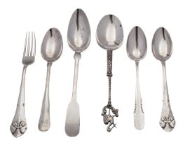 Six pieces of Continental silver flatware, standards vary, including: a Dutch cast handle spoon,