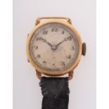 A lady's 18ct gold wristwatch the silvered dial with Arabic numerals and blued steel moon hands,