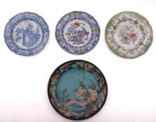 A Japanese cloisonné plate decorated wit