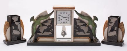 An Art Deco marble clock with seagulls t