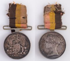 A China War Medal, 1842, edge erased.