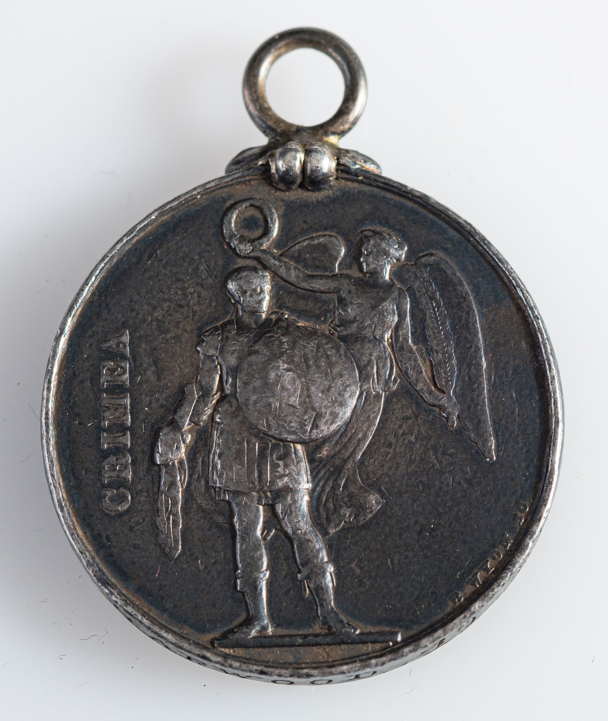 A Crimea Medal to 'George Harwood 19th Regt', (poor condition,