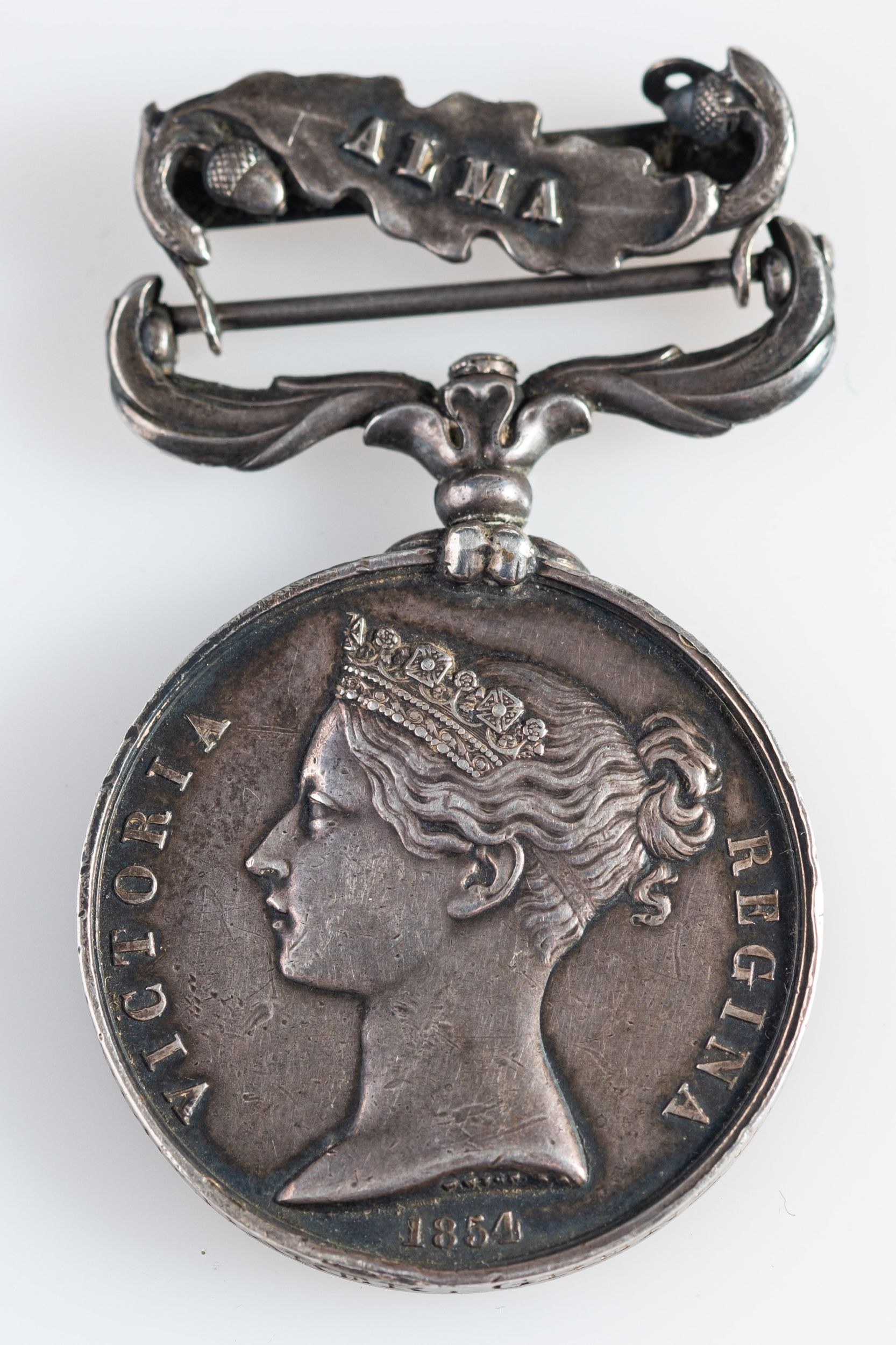 A Crimea Medal with Alma clasp to 'Private Robt Baker Grenr Guards'.
