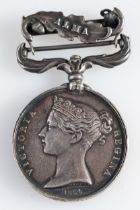 A Crimea Medal with Alma clasp to 'Private Robt Baker Grenr Guards'.