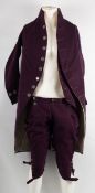 A George III gentleman's plum court three-piece court suit comprising a tailcoat with cut steel