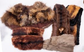A collection of furs, comprising a fur cape by A Shulman, Baltimore, two stoles etc. .