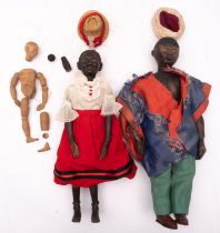 Two early 20th century African, possibly Nigerian carved wooden dolls,
