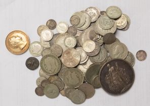 A bag of pre 1947 and 1920 coins with 1923 peace dollar, medallions, etc.