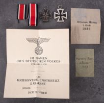 Two WWII Iron Crosses , Second Class, both with related ephemera.