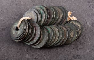 A collection of thirty-five Tang and later Chinese cash coins