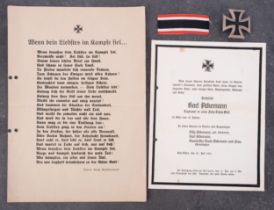 A WWII Iron Cross, First Class, unnamed , the bar stamped '925' in case of issue ,