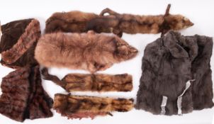 A collection of various furs, comprising a full length fur coat,