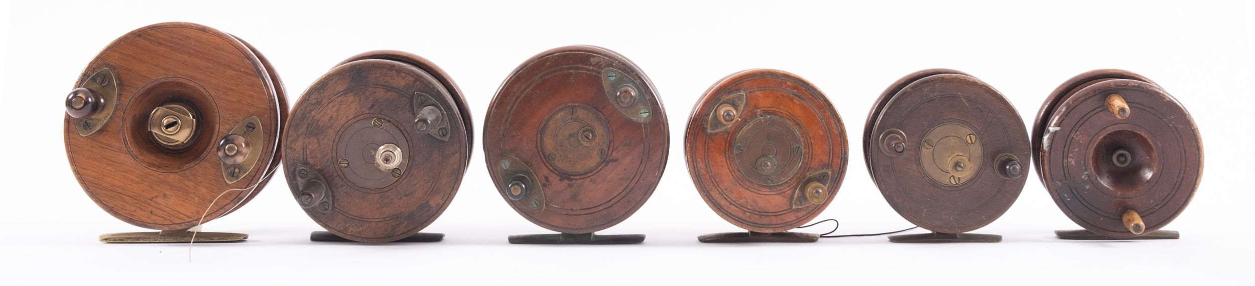 A Nottingham mahogany and brass Fishing Reel stamped 'Richardson & Lye, Cape Town,