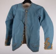 An 18th-century blue satin gentleman's short jacket of smaller proportions, possibly for a youth,