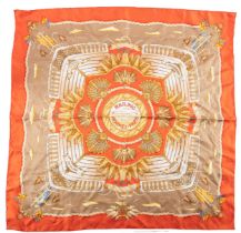 A Hermes orange silk scarf of 'Railing' pattern, after the design of J.Metz circa 1998 90 x 90cm.