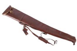 An Ashwood Leather Company brown leather guncase.