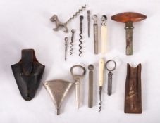 An assortment of various 19th- and early 20th-century corkscrews comprised of picnic examples