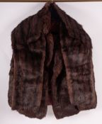 A mid 20th century half-length fur coat, unsigned,